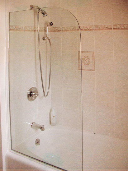 Shower door spray strip